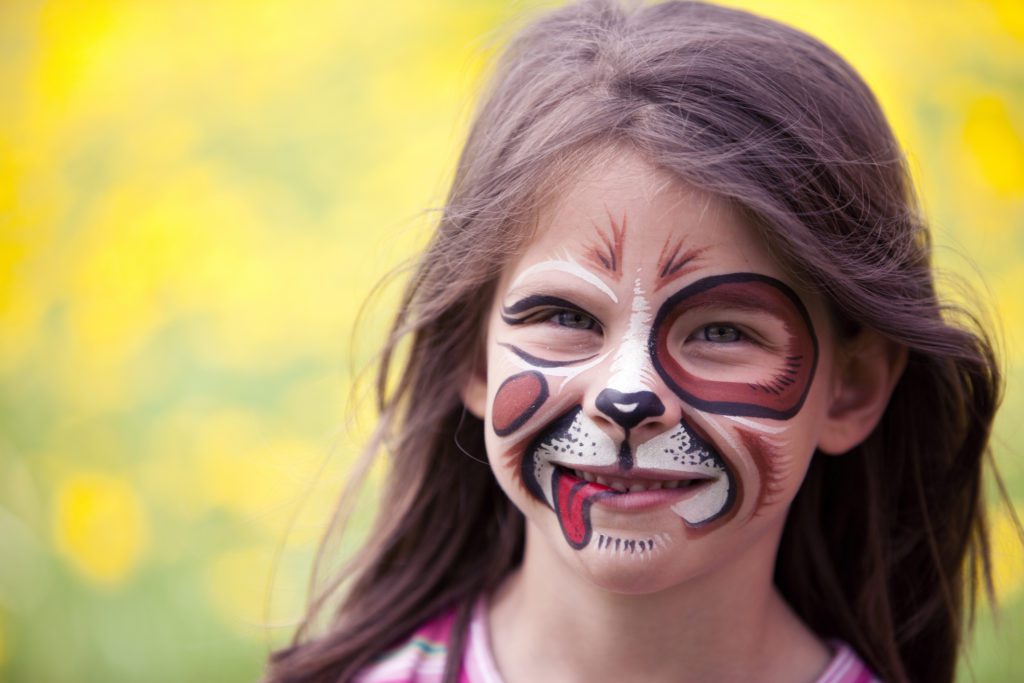 Girl with her face painted like a dog at one of the top spring events in myrtle beach