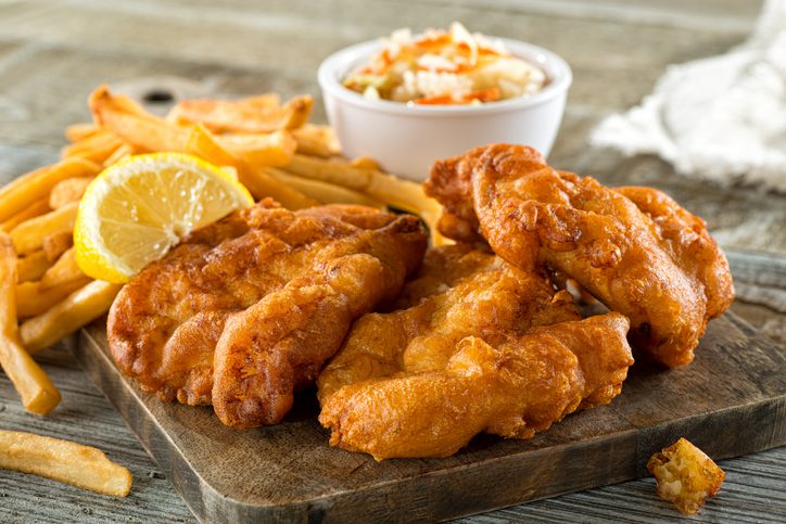 Fish and chips platter with fries and coleslaw